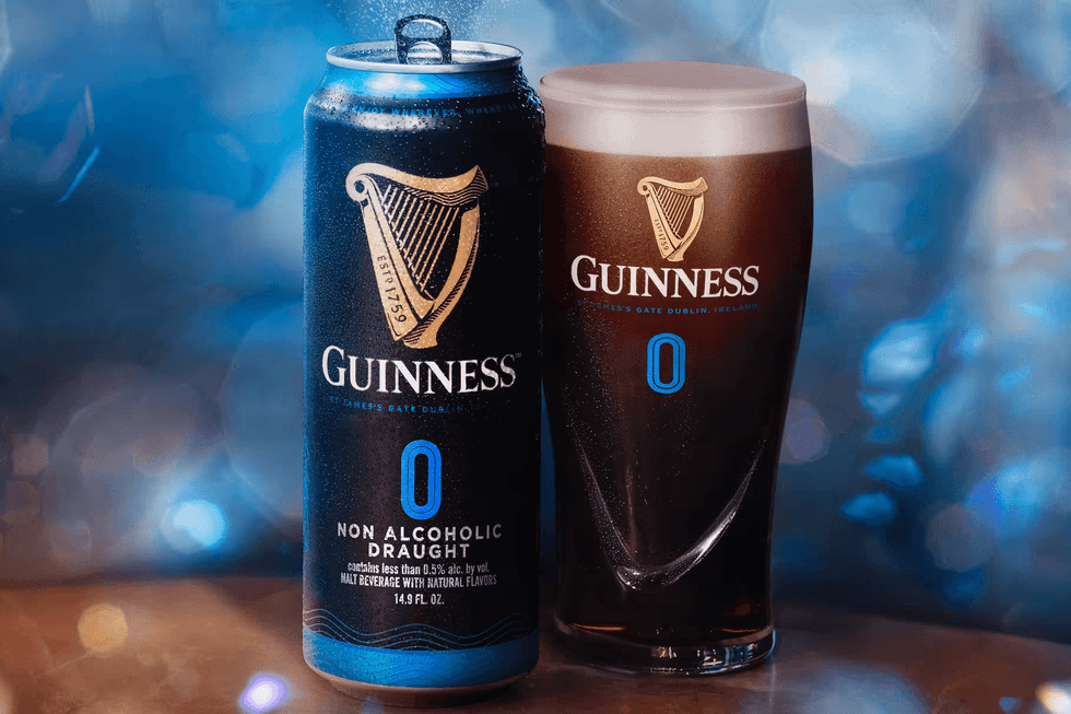 A can and full pint glass of Guinness non alcoholic beer