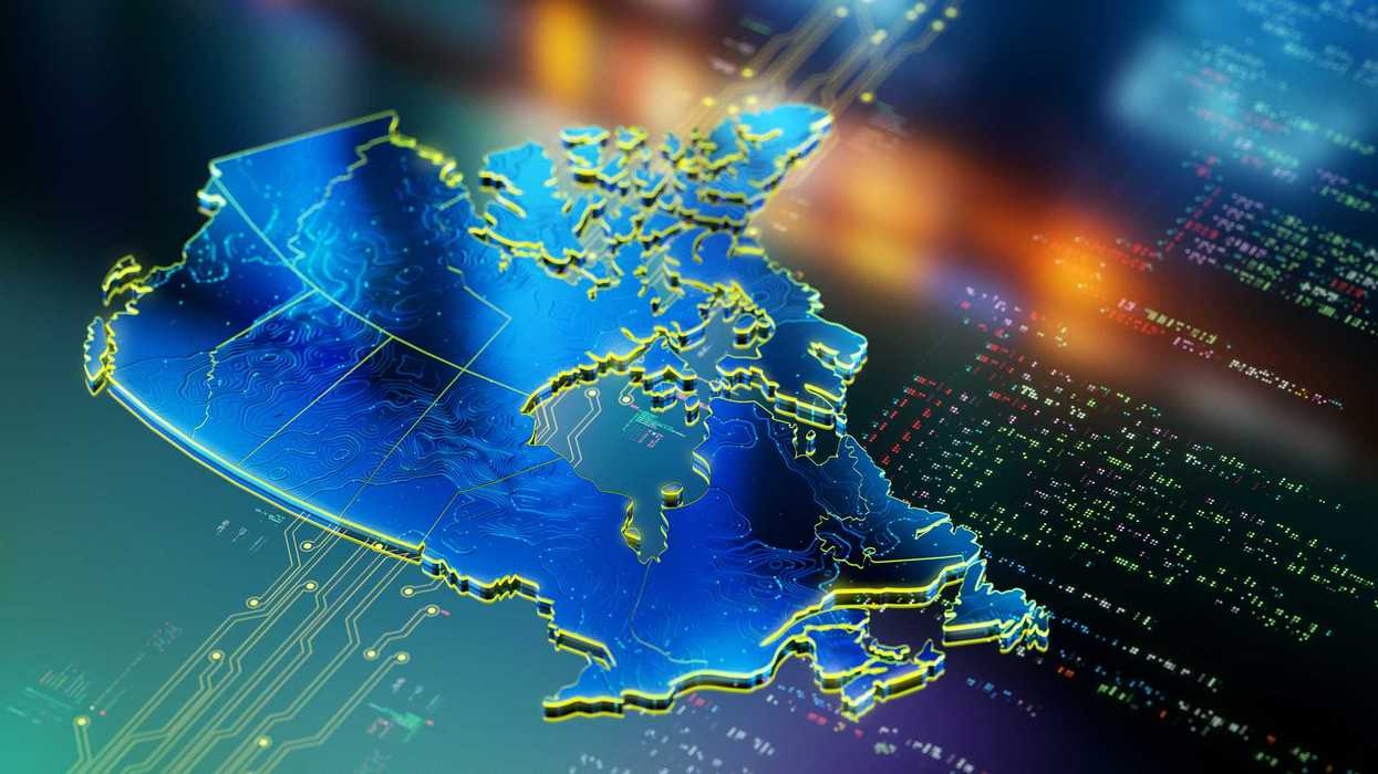 A computer chip shaped like canada placed in a motherboard