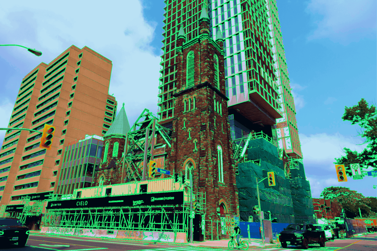 Bloor Street United church in toronto, mostly demolished with condo construction overhead