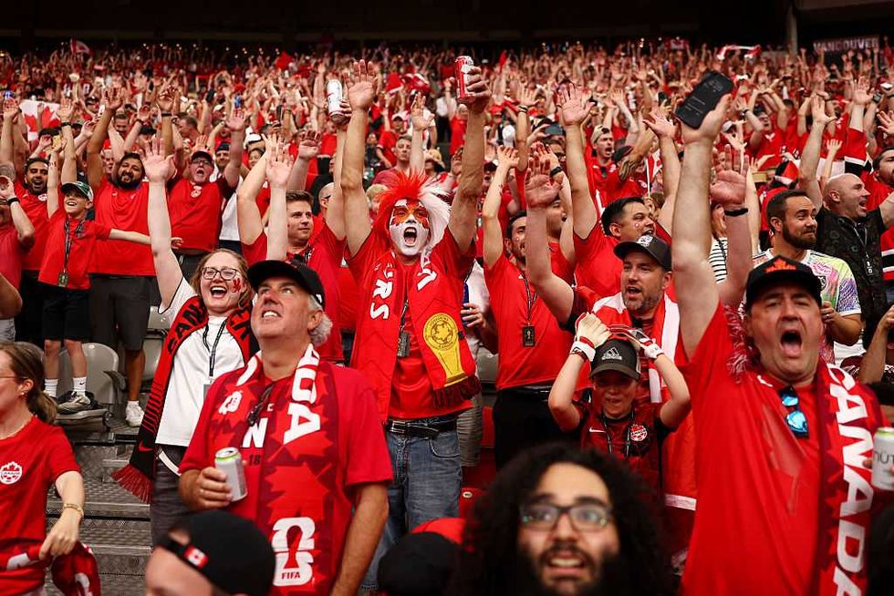 Canadian fans cheer at the Canada versus Qatar game