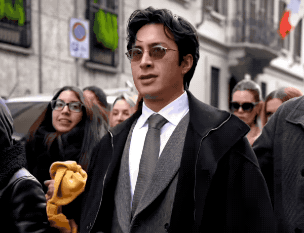 GIF of Hudson Williams smoking a cigarette at Paris Fashion Week