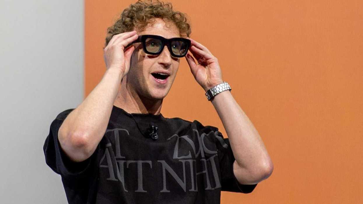 Mark Zuckerberg models the Meta glasses on stage