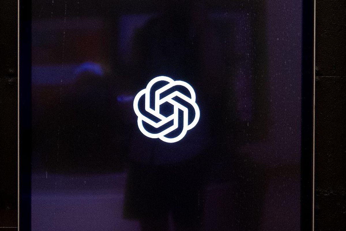OpenAI's logo appears on a dark digital screen.