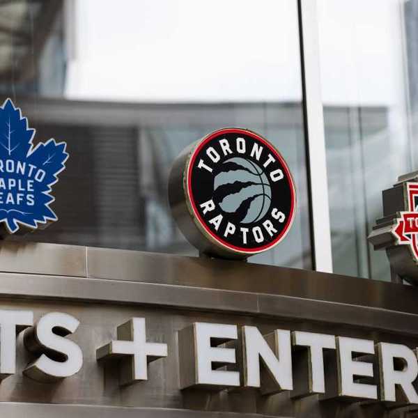 The front of the Maple Leafs Sports and Entertainment building with logo of the sports team they own